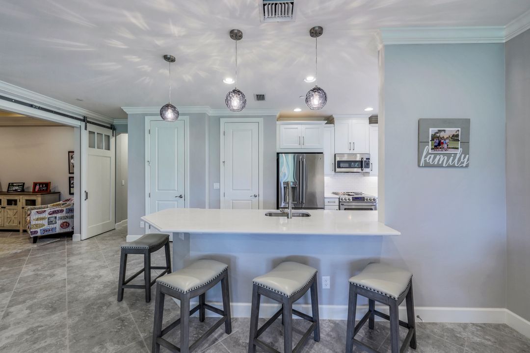 8773 Bellano Ct #101, Naples, FL 34119