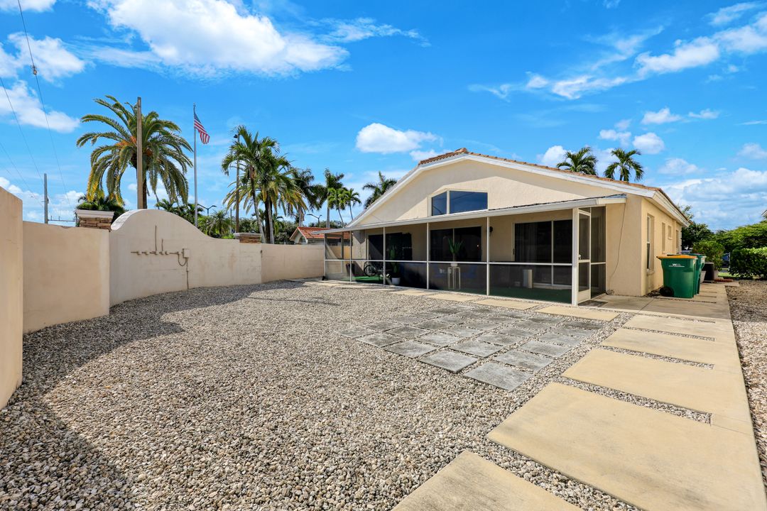 5018 Eclipse Ct, Naples, FL 34104
