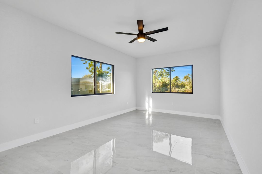 1222 Hilliard St E, Lehigh Acres, FL 33974