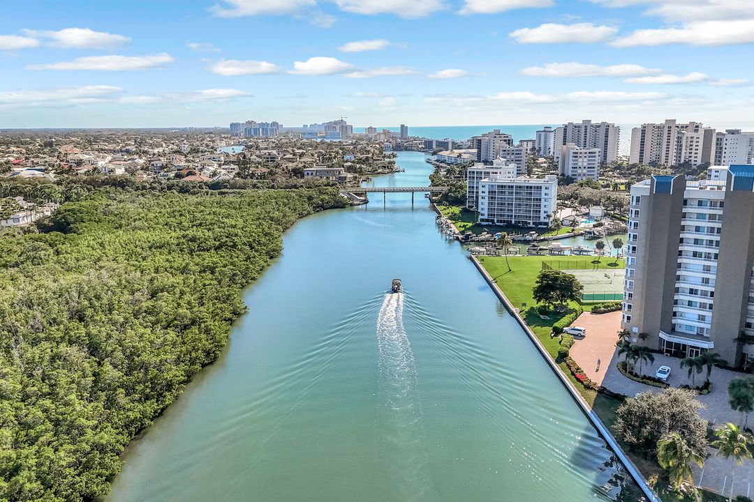 21 Bluebill Ave, Naples, FL 34108