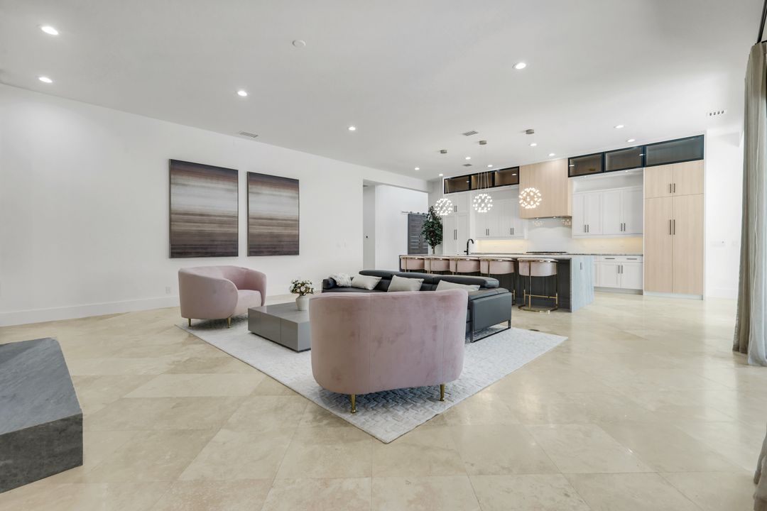 13087 Pond Apple Dr E, Naples, FL 34119