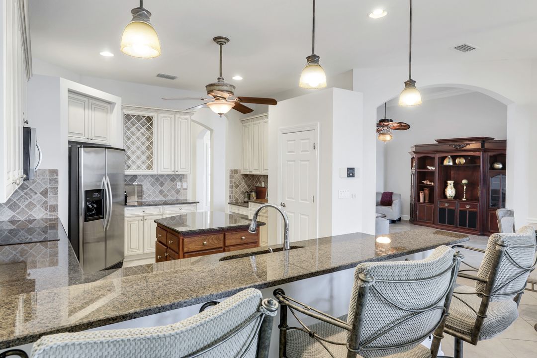 8765 Hideaway Harbor Ct, Naples, FL 34120