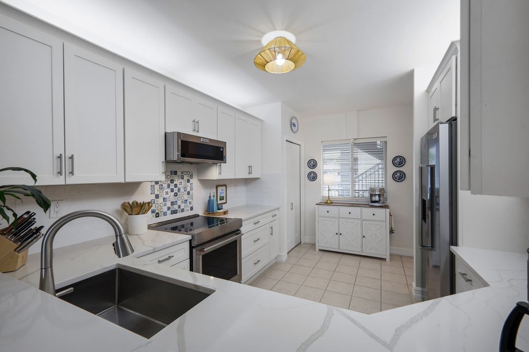 7822 Great Heron Way #201, Naples, FL 34104