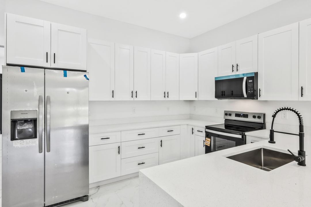 521 Lillon Ave S, Lehigh Acres, FL 33974