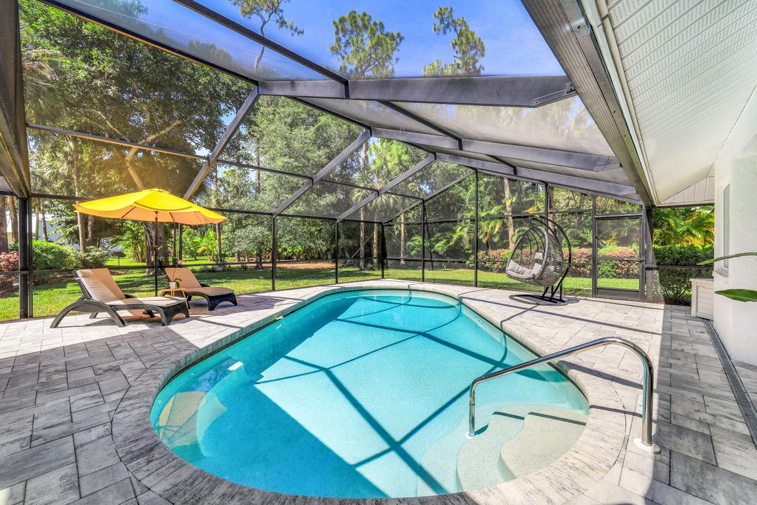 6010 Standing Oaks Ln, Naples, FL 34119