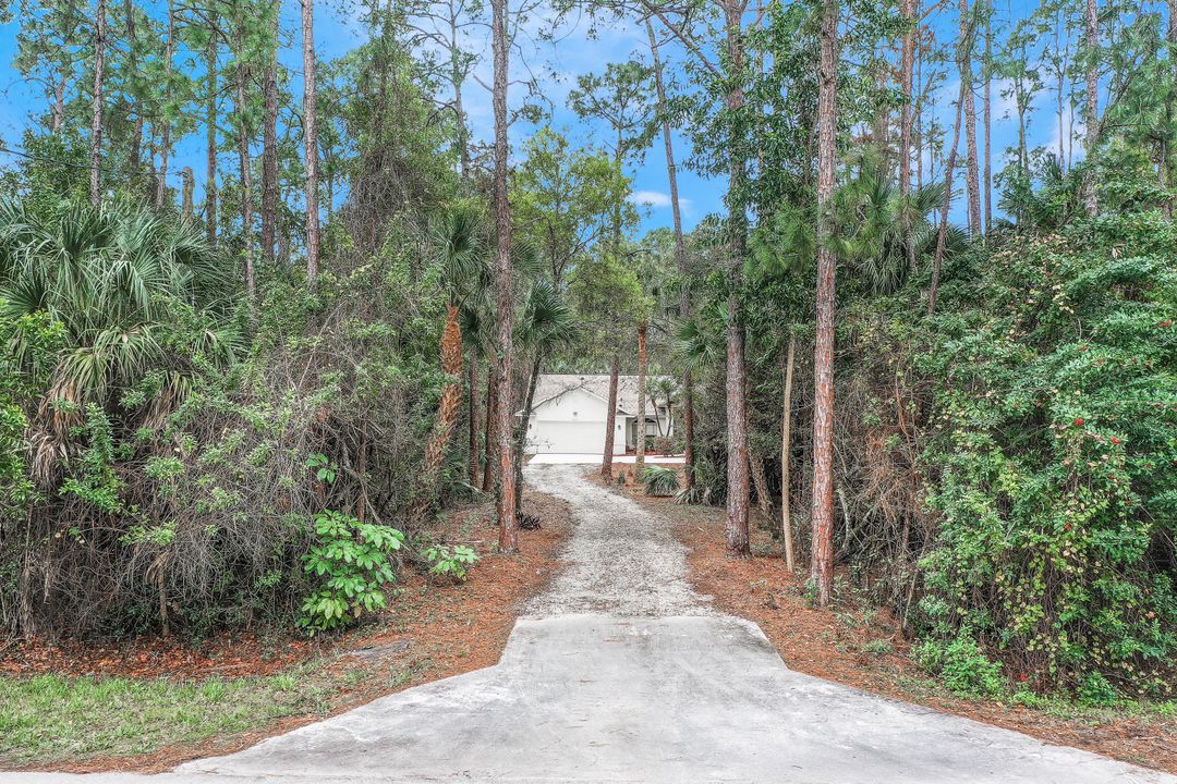 6030 English Oaks Ln, Naples, FL 34119