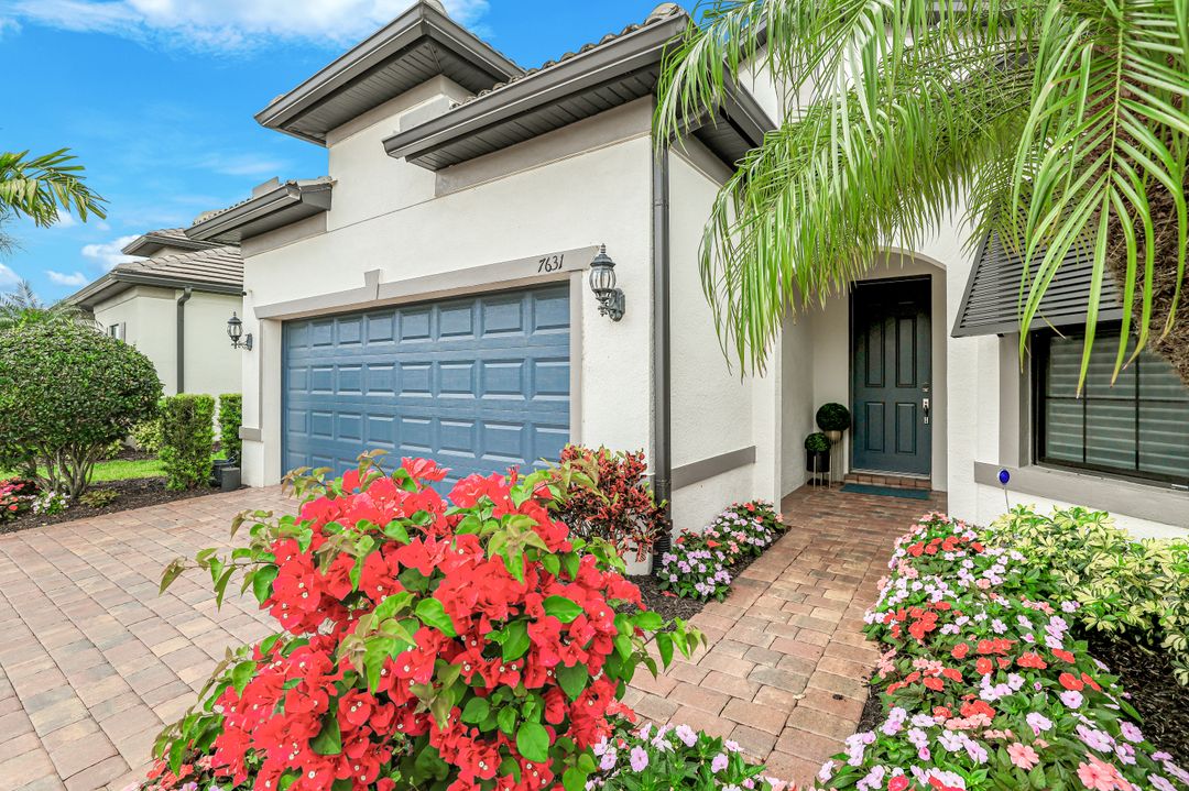 7631 Winding Cypress Dr, Naples, FL 34114