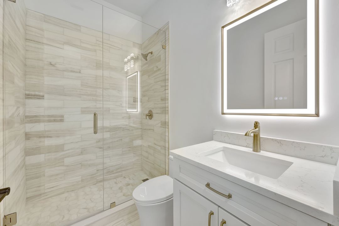 9209 Troon Lakes Dr, Naples, FL 34109