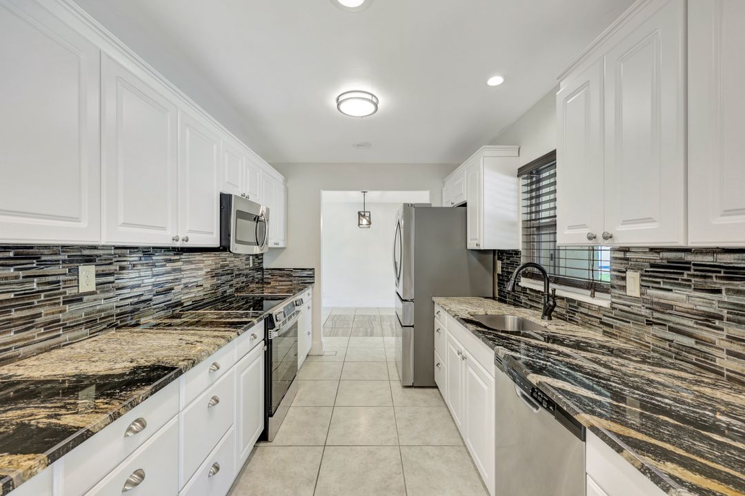 124 Flame Vine Dr, Naples, FL 34110