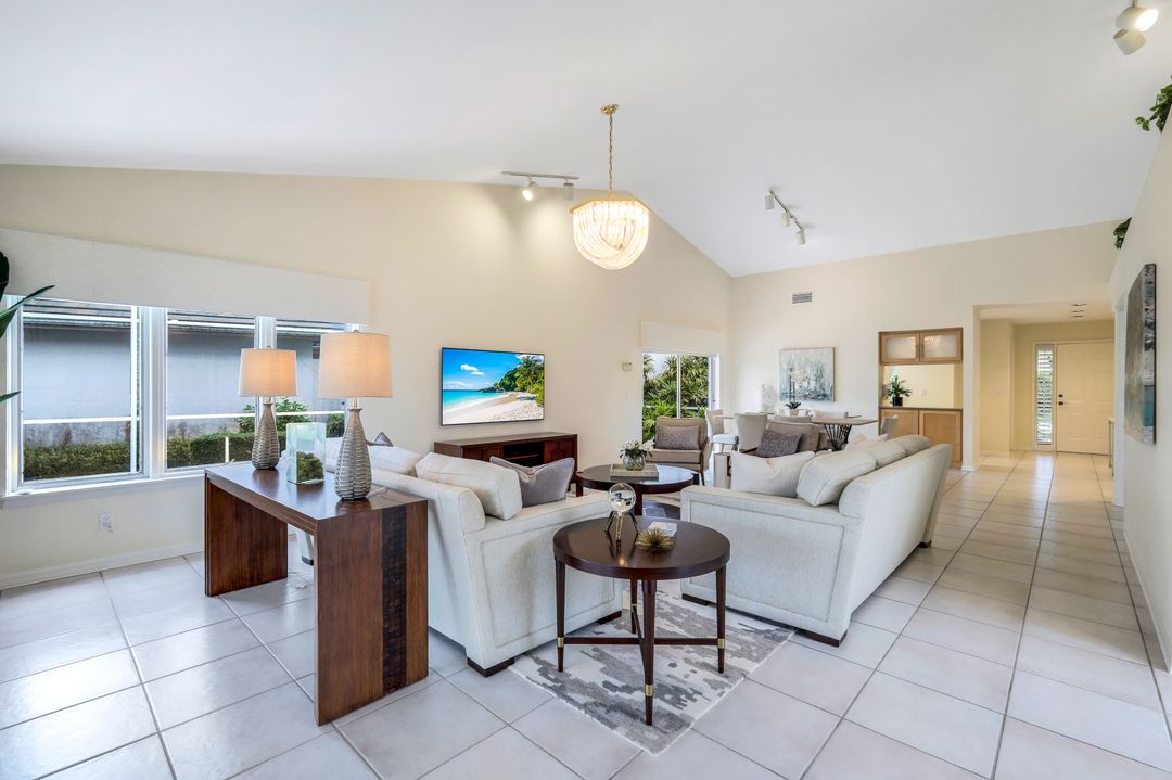 703 Heathery Ln, Naples, FL 34108