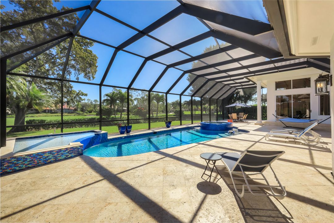 12924 Bald Cypress Ln, Naples, FL 34119