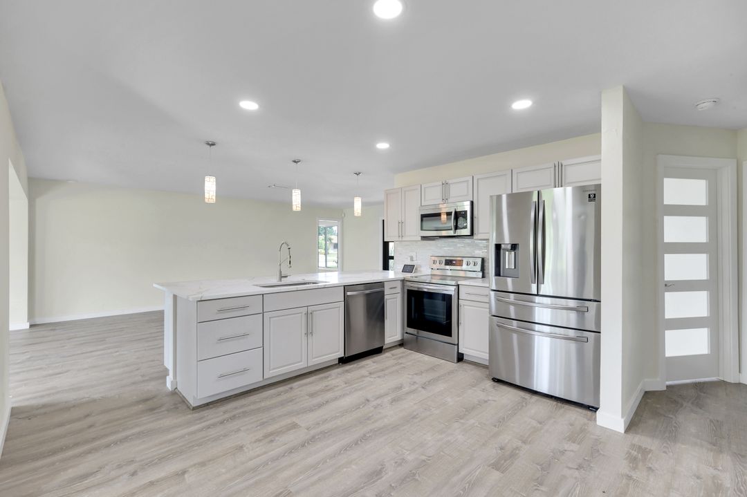 1202 SE 14th Terrace, Cape Coral, FL 33990