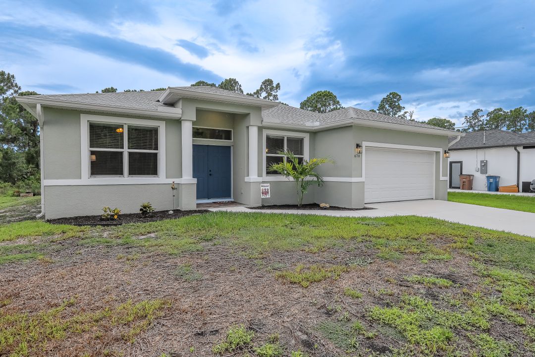 670 Nimitz Blvd, Lehigh Acres, FL 33974