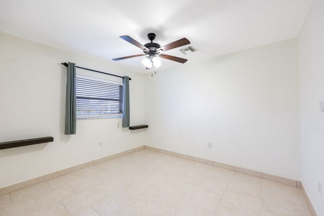 169 Baltusrol Dr, Naples, FL 34113
