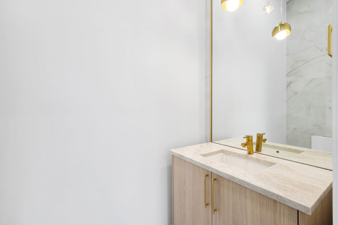 13087 Pond Apple Dr E, Naples, FL 34119