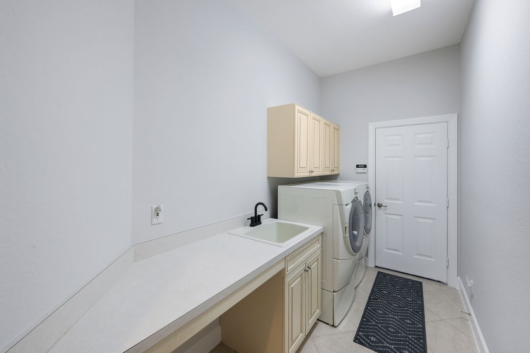 8765 Hideaway Harbor Ct, Naples, FL 34120