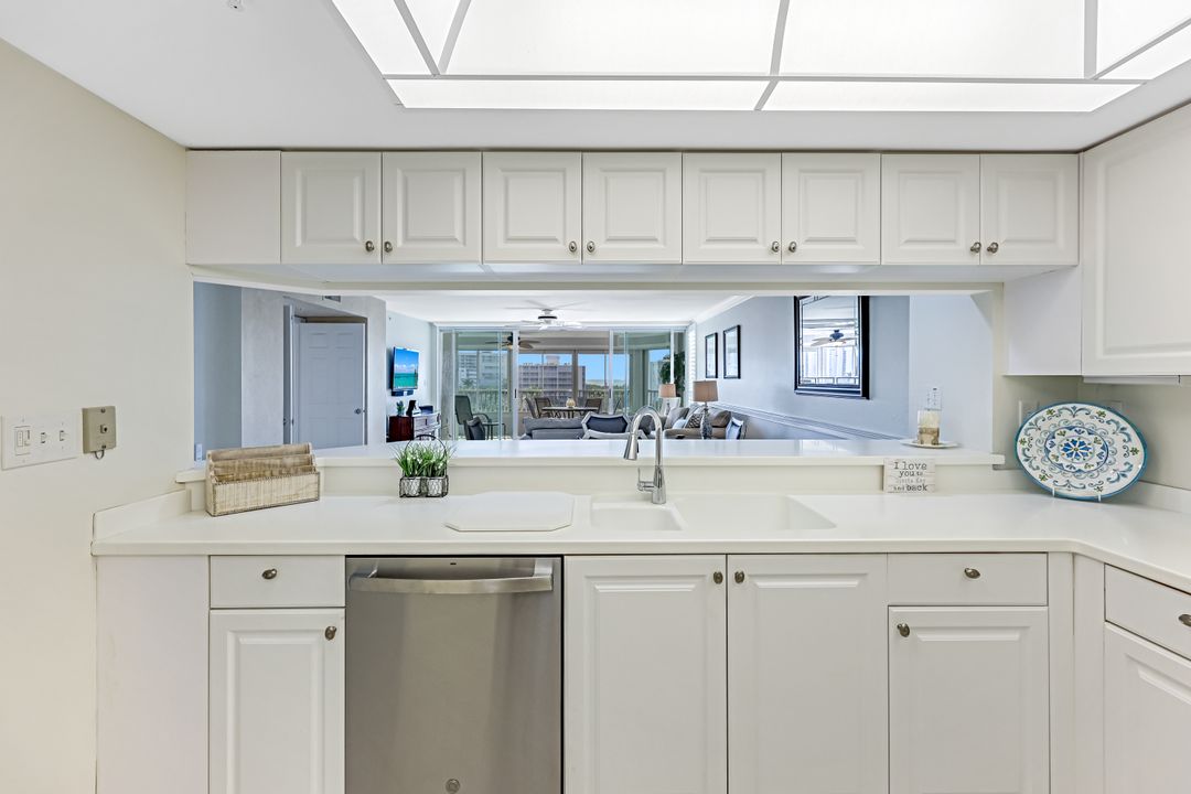 21 Bluebill Ave, Naples, FL 34108