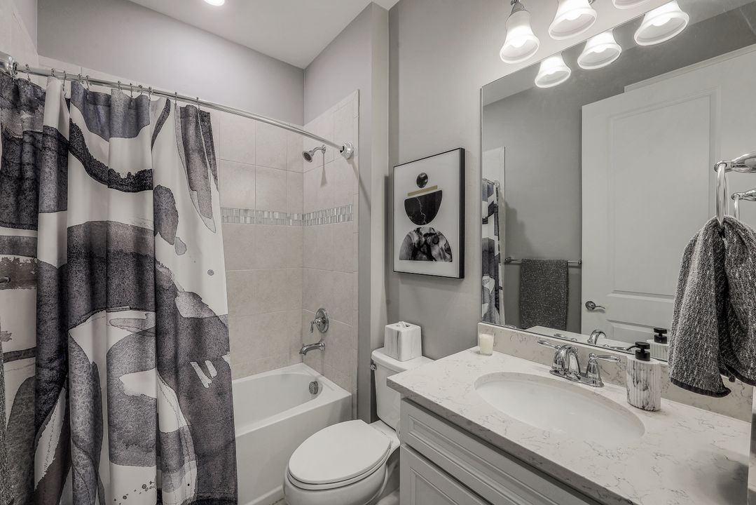 7692 Winding Cypress Dr, Naples, FL 34114