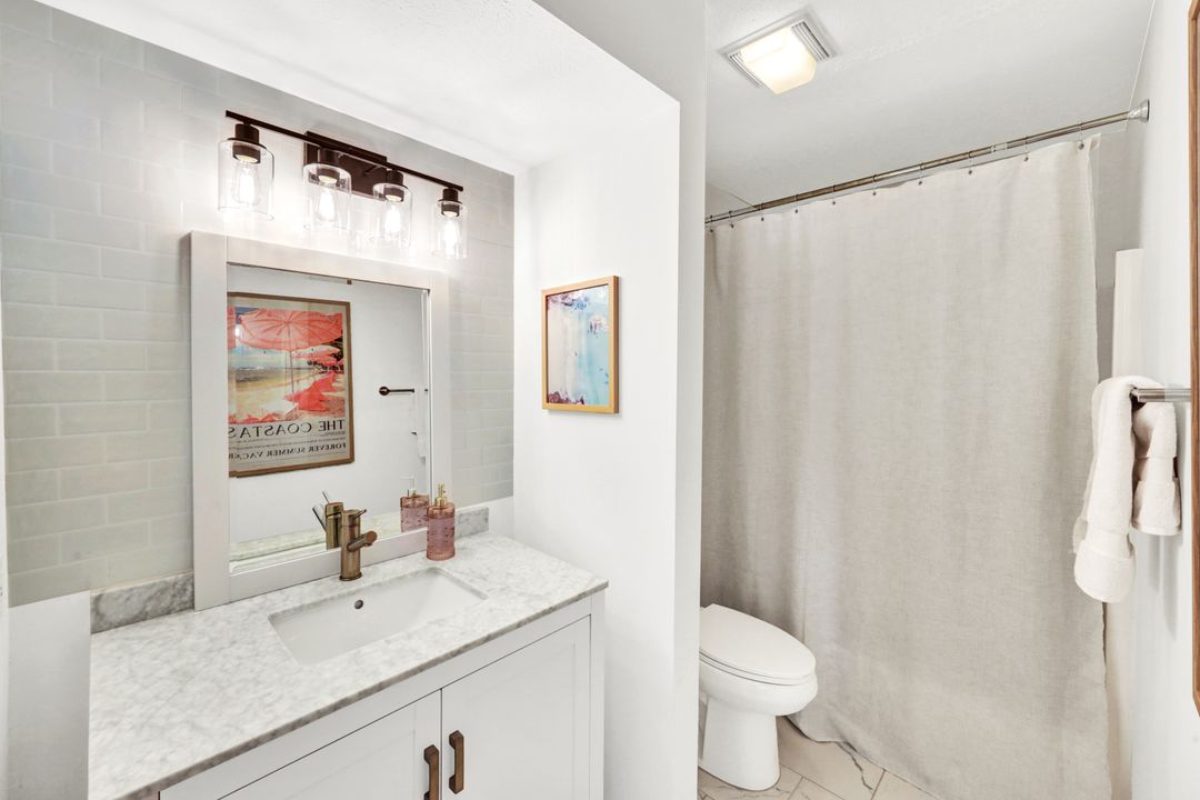 1285 Grand Canal Dr, Naples, FL 34110