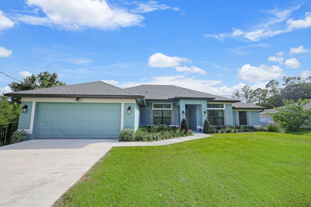 497 Windermere Dr, Lehigh Acres, FL 33972