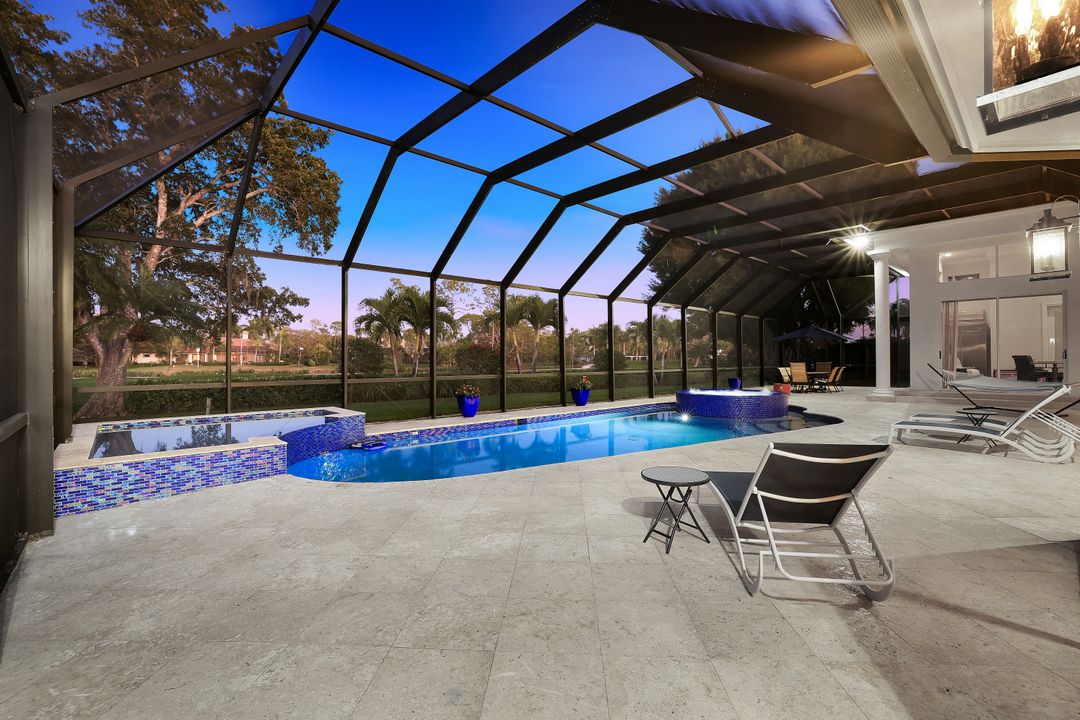 12924 Bald Cypress Ln, Naples, FL 34119