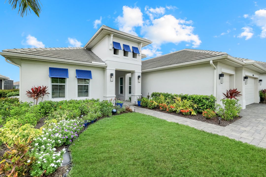 14386 Laguna Spgs Ln, Naples, FL 34114