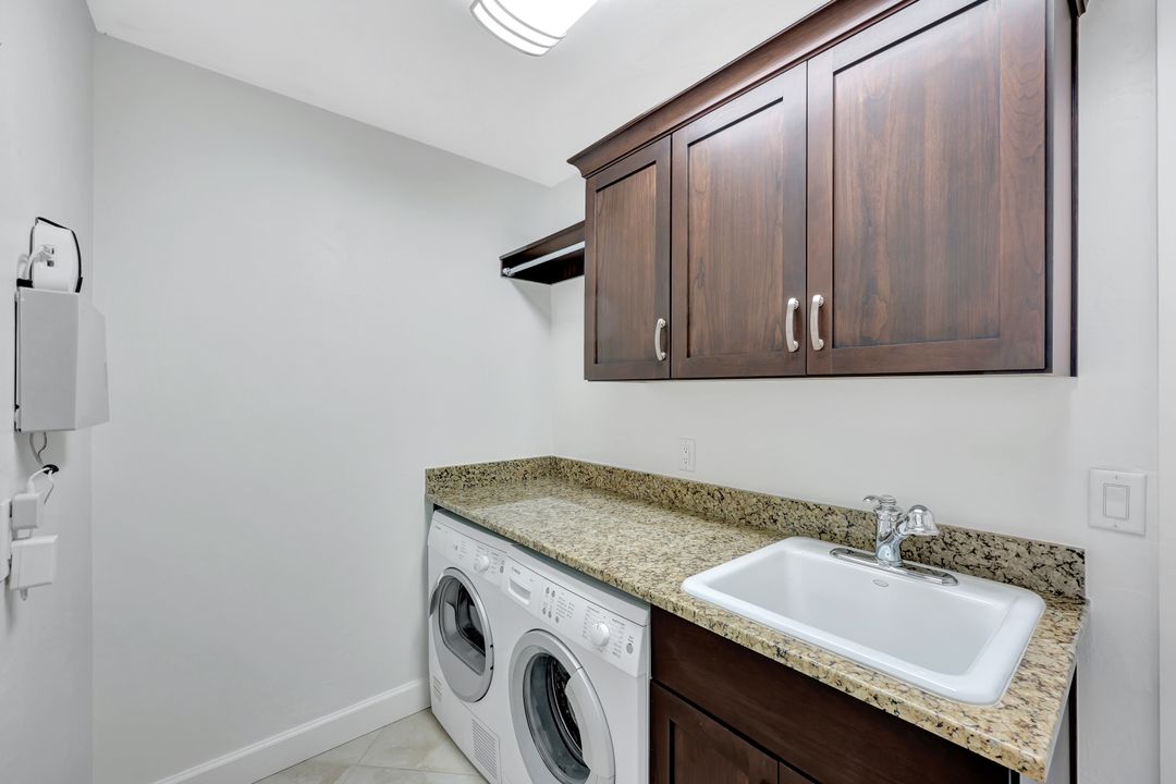6 Las Brisas Way, Naples, FL 34108