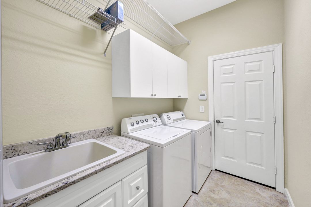 11921 Heather Woods Ct, Naples, FL 34120