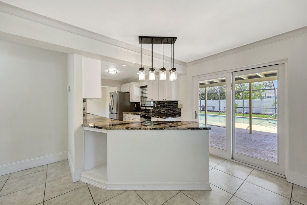 124 Flame Vine Dr, Naples, FL 34110