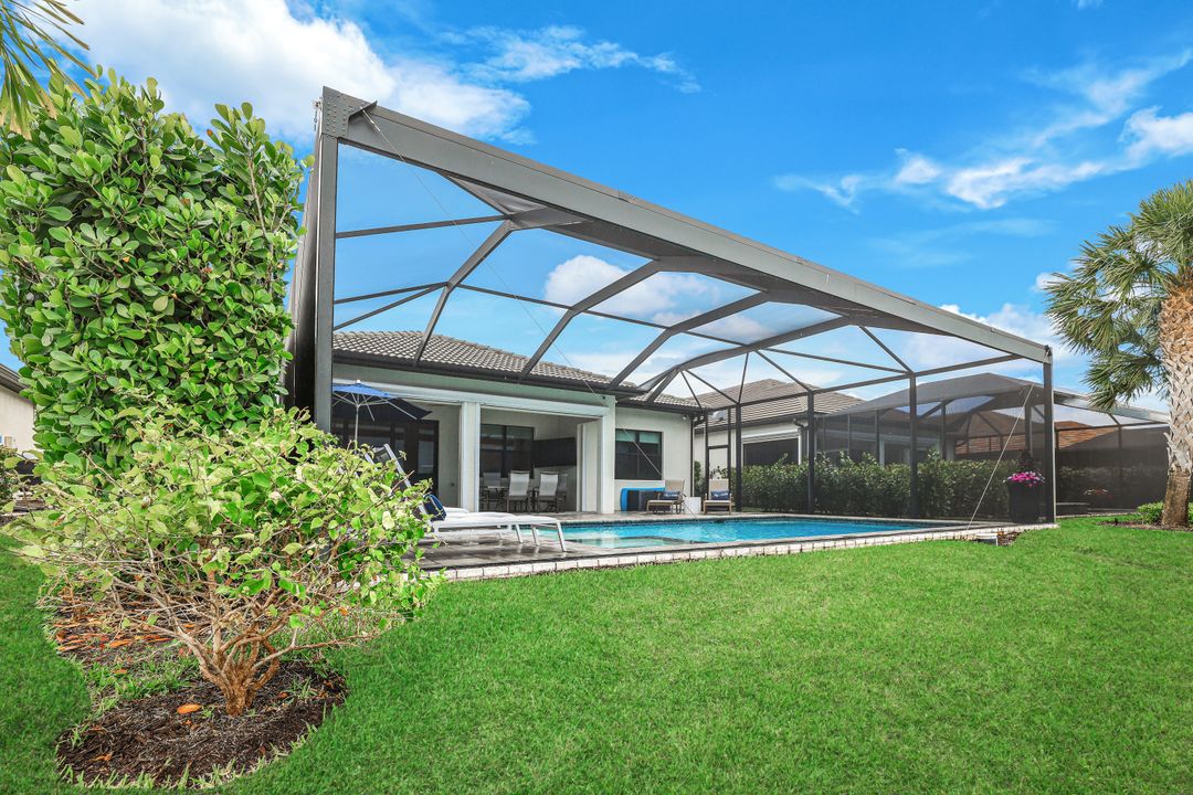 7631 Winding Cypress Dr, Naples, FL 34114