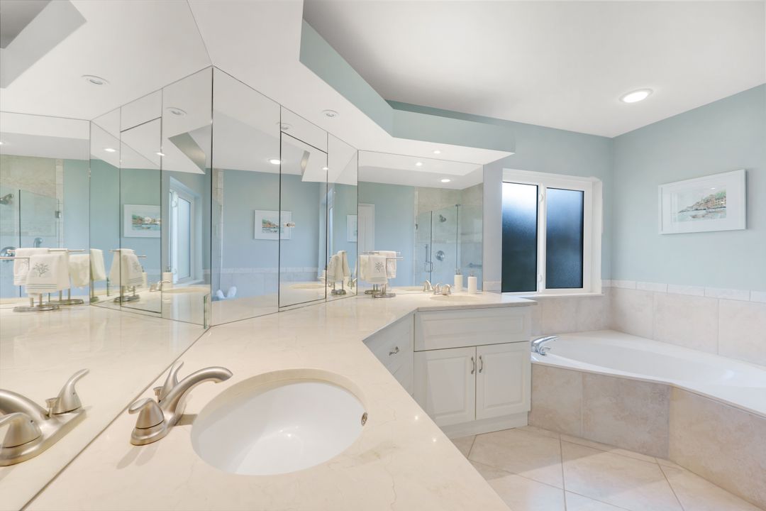 7048 Pelican Bay Blvd #C104, Naples, FL 34108
