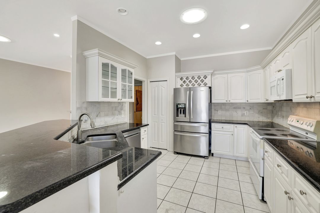 173 Stanhope Cir, Naples, FL 34104