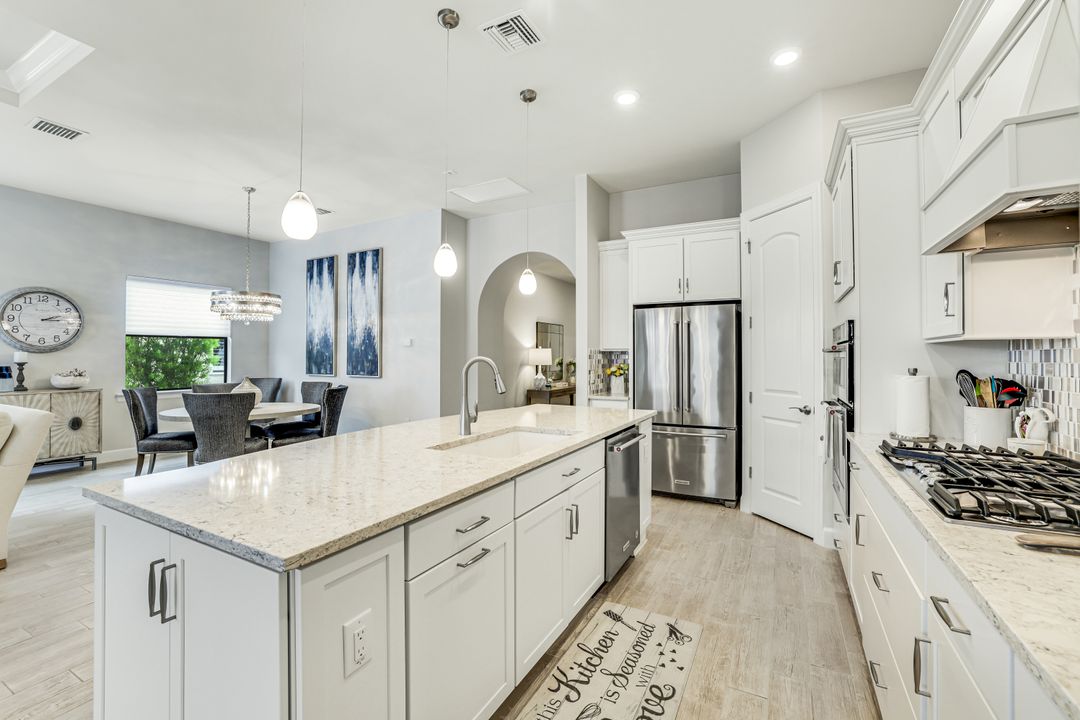 7631 Winding Cypress Dr, Naples, FL 34114