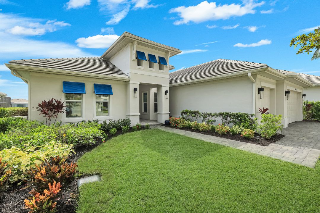 14386 Laguna Spgs Ln, Naples, FL 34114