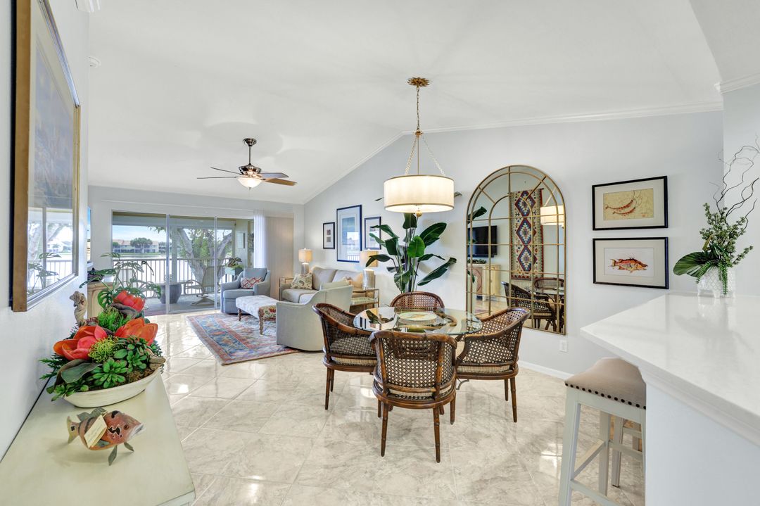 7742 Emerald Cir #V203, Naples, FL 34109