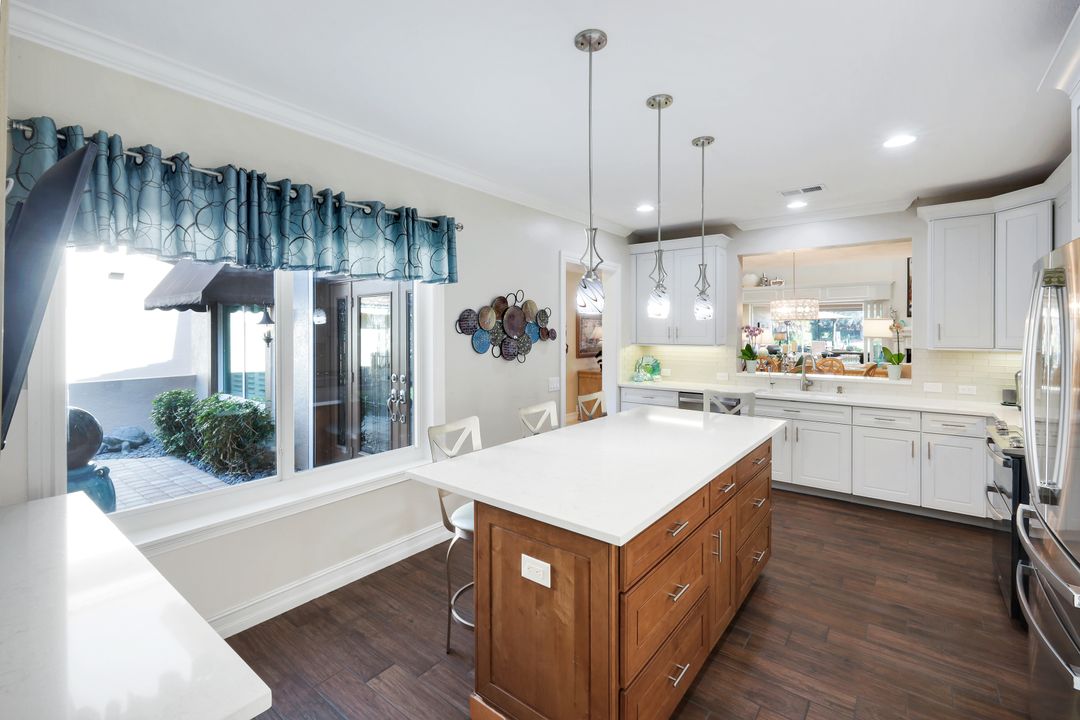 11426 Quail Village Way, Naples, FL 34119