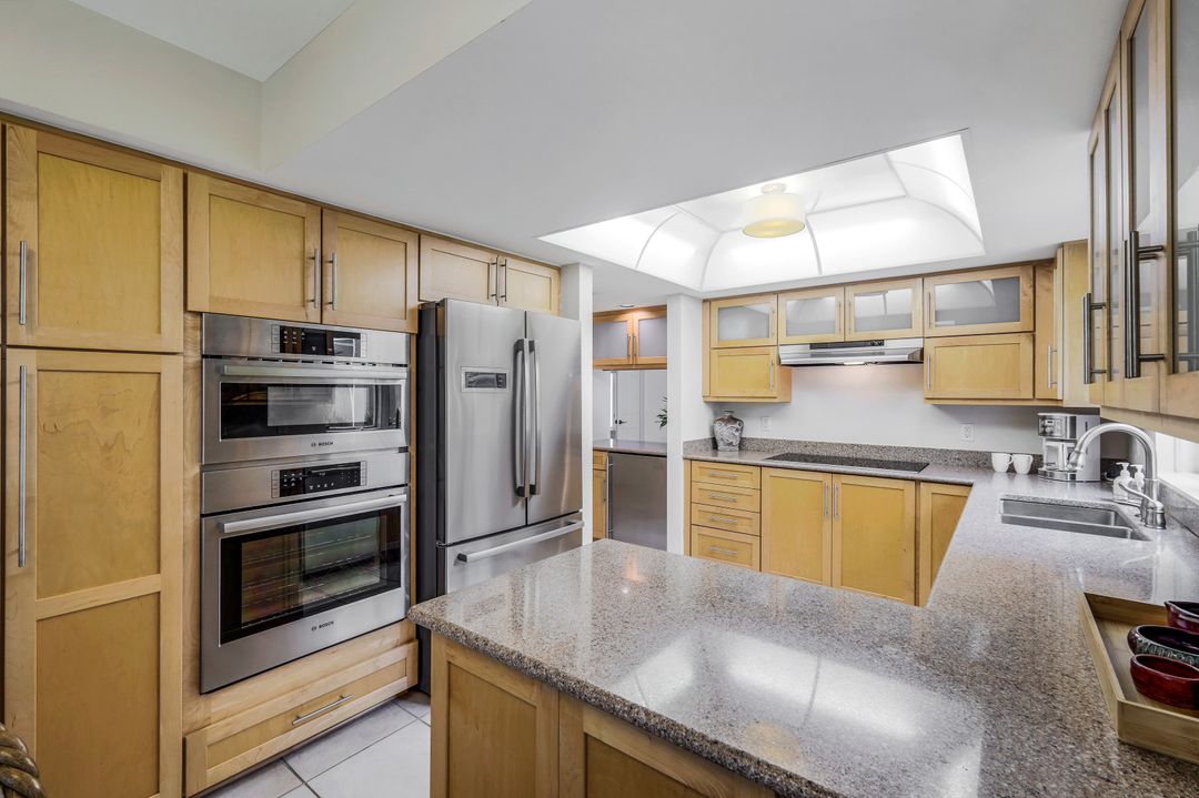 703 Heathery Ln, Naples, FL 34108