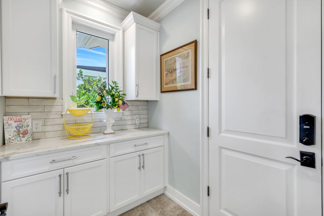 491 Wedge Dr, Naples, FL 34103