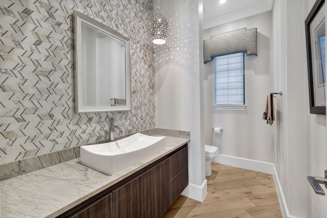 16988 Fairgrove Way, Naples, FL 34110