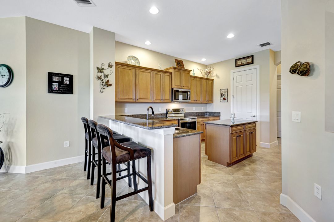 9693 Cobalt Cove Cir, Naples, FL 34120