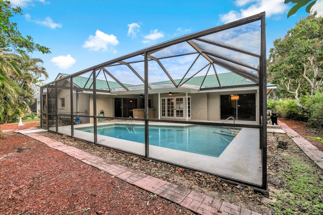 196 Baltusrol Dr, Naples, FL 34113