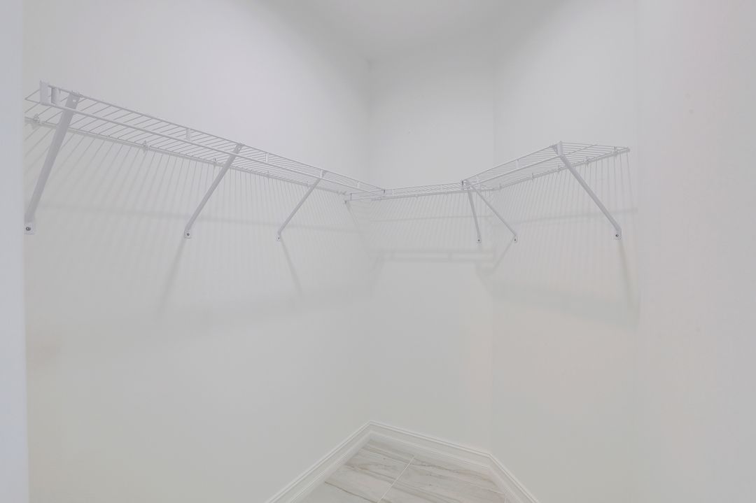 7473 Rockefeller Dr, Naples, FL 34119