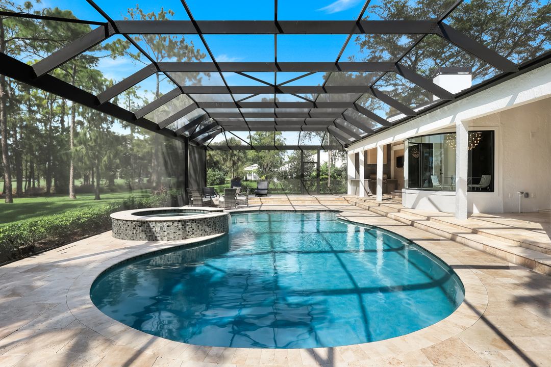 13087 Pond Apple Dr E, Naples, FL 34119
