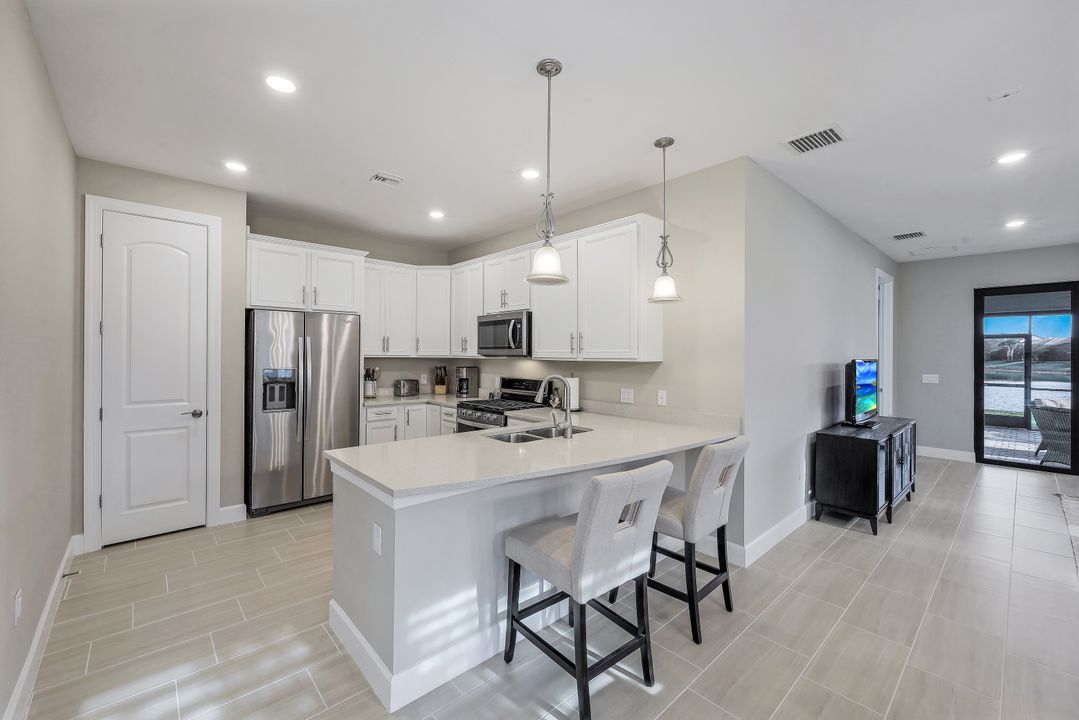 7790 Jacaranda Ln, Naples, FL 34114
