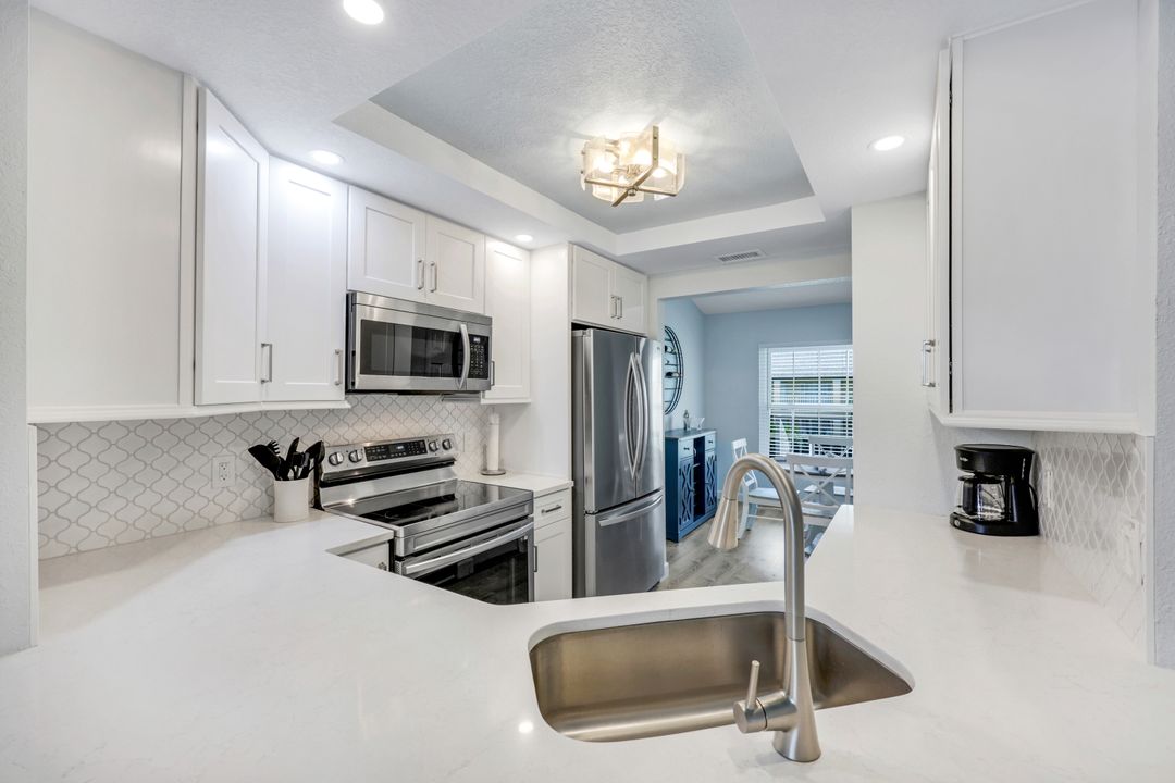 774 Wiggins Lake Dr #203, Naples, FL 34110