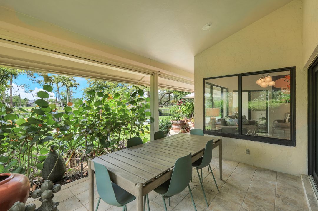 12975 Bald Cypress Ln, Naples, FL 34119