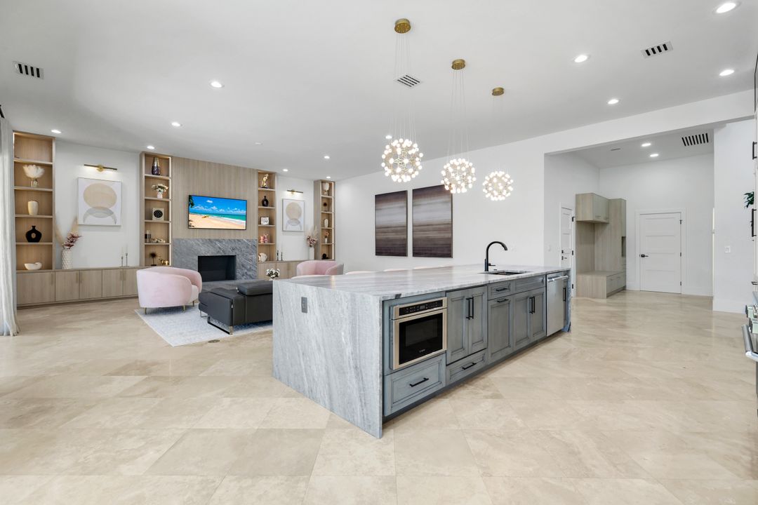 13087 Pond Apple Dr E, Naples, FL 34119