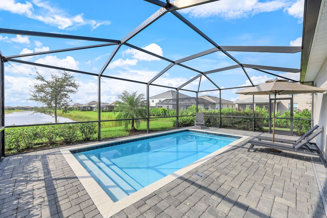 2214 Cara Cara Way, Naples, FL 34120