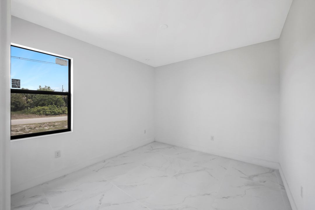 100 Parish Dr, Lehigh Acres, FL 33974