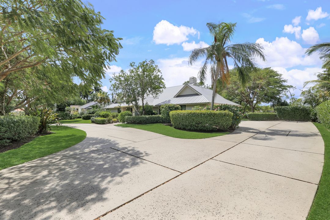 12975 Bald Cypress Ln, Naples, FL 34119
